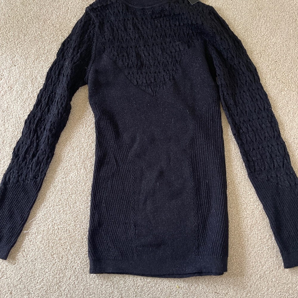 Women’s knit turtleneck sweater.